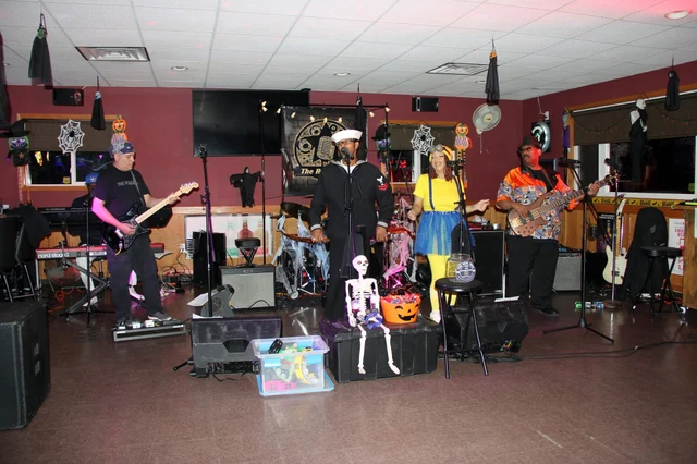 The Real Deal performing in Halloween costumes at Kings