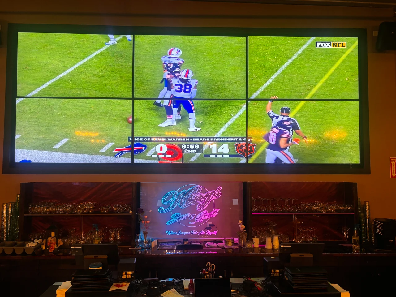 The real six-screen Megatron wall and illuminated Kings sign above the working bar
